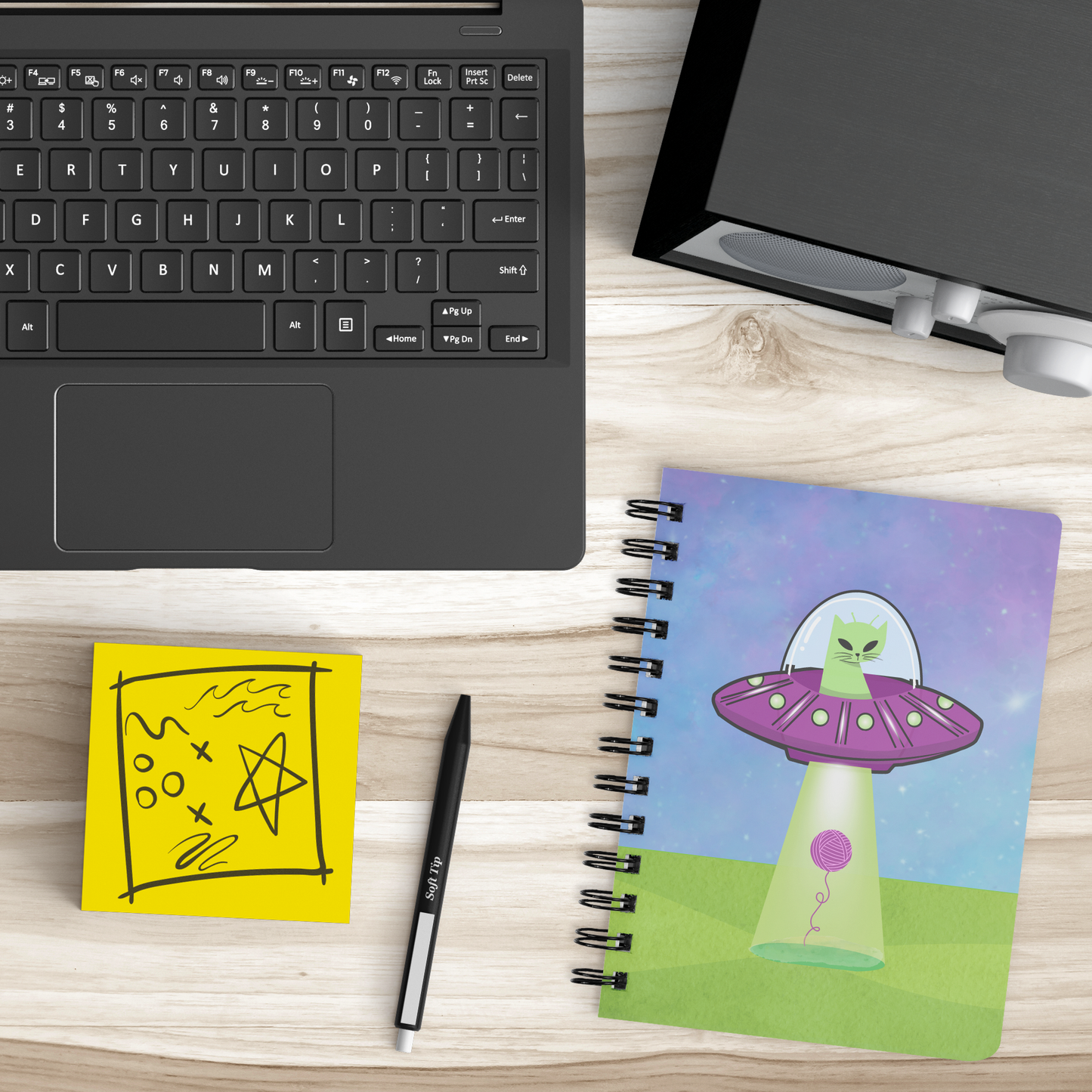 Alien_Cat_Beaming_up_String_Spiralbound__SB_Lifestyle_Mockup.png